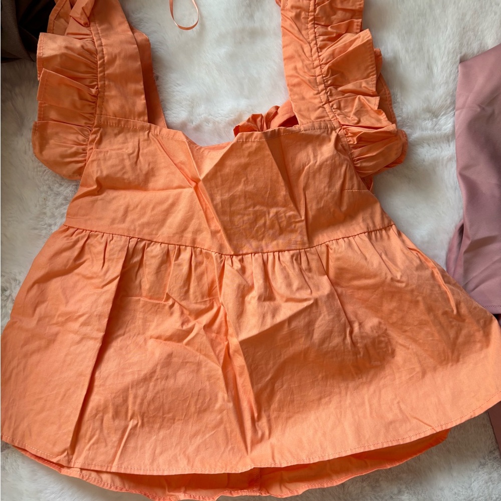 Orange Ruffled Sleeveless Top